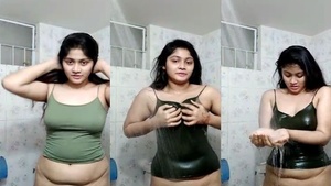 Pantyless Desi Indian girl enjoying shower dancing on cam