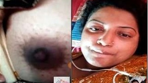 Exclusive Desi Bhabhi Shows her tits to her lover in a video call
