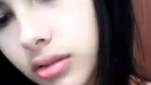College seduces and rubs her pussy on Webcam