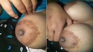 A horny Mallu Bhabhi on camera with her tits