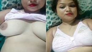 Sexy Assami Budi shows off her big tits and pussy