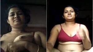 Boady's showing her tits and jerking off with her fingers.