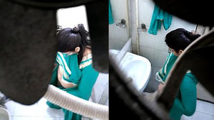 Toilet capture of a Desi bhabhi in the bathroom