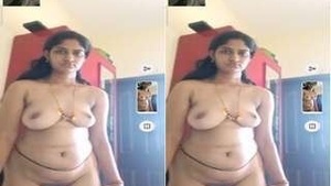 Amateur Telugu Bhabhi Teases with Her Breasts and Pussy