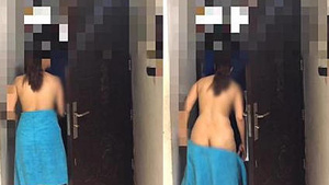 Desi wife takes on a towel drop challenge in front of the delivery boy