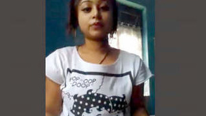 Desi Indian girl strips and teases her lover with her sexy body