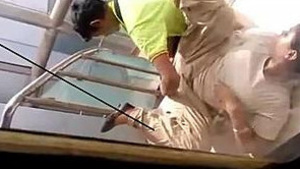 Desi auntie caught on camera getting fingered and groped by coworker on the mall stairs