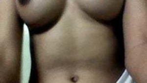Ex-College Girl with Big Boobs Undresses on Camera to Show Off Her Natural Breasts