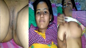 A plump girl with big breasts and a tight pussy gets naked