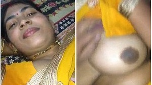 Randy Bhabhas sexy look as she caresses her breasts