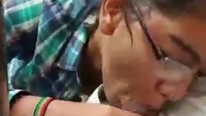 Indian babe in porn video gives her lover a blowjob in his car