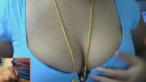 Auntie with Gorgeous Boobs Shows Them Off on Camera