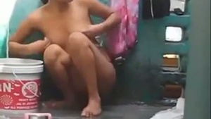 Amateur couple enjoys outdoor bath time together