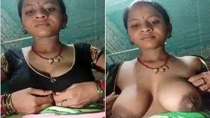 Exclusive Desi Bhabhi flaunts her big boobs and pleasures herself with her fingers