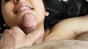 Nri babe gives a sensual handjob and receives a facial cumshot