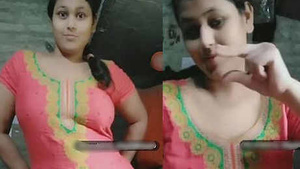Homely girl with massive round boobs flaunts her curves
