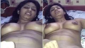Desi wife indulges in some solo play with a pink dildo