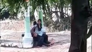 College lover outdoors fucking dressed