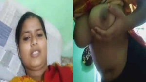 A Bengali village girl flaunts her ample breasts on camera