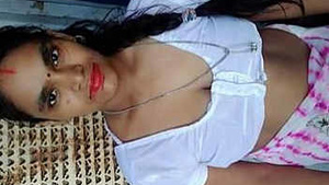 Busty Indian housewife in a sexy show in a nude blouse