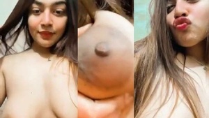 Desi girl with big boobs flaunts her assets in steamy video
