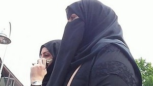 Hijab-Clad Spitfire: A Seductive Encounter