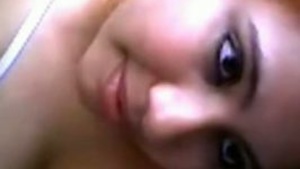 A young and chubby girl strips down for her boyfriend on camera