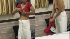 Exclusive Desi Bhabhi strips and gets ready for sex