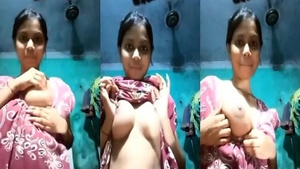 Young girl flaunts her ample breasts in a steamy video