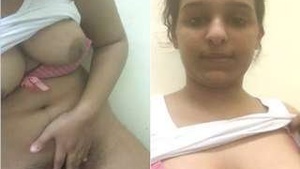 Exclusive Indian Girl Teases with Her Breasts and Genitalia