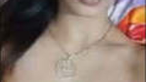 Hot teen Tamil girl pressing her breasts