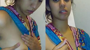 pretty girl pressing breasts