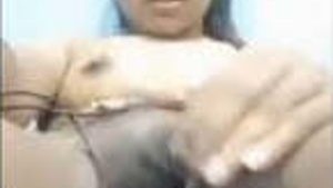 Tamil girl shows her breasts and wet pussy