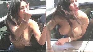 crazy topless slut screaming from a car on the public road