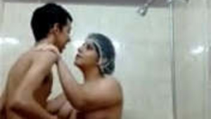 Big tits of aunt sucked by lucky little girl in shower