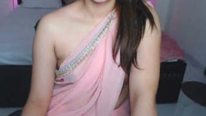 Hot cousin in transparent saree showing her milky white tits and talking dirty