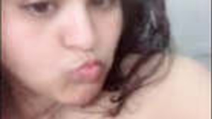 Sexy ebony teen European girl sucking her big tits