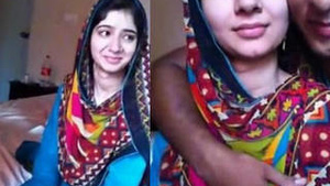 Beautiful Pakistani woman kissing and kissing her boyfriend’s chest