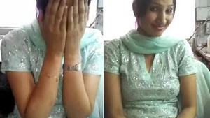 Pretty Indian woman with large breasts in a press conference.