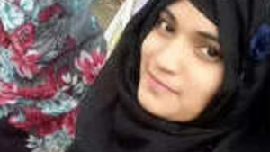 Pretty blonde Indian woman posing for video call