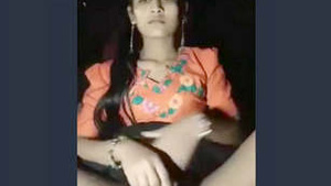 Finger fucking tight pussy of a girl and making her to get an orgasm