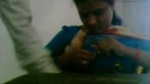 Clip of a scandal with a school teacher and an office boy in a South Indian setting.