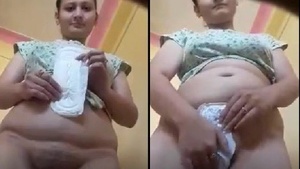My sly bhabhi undressing and showing her private parts for her lover.