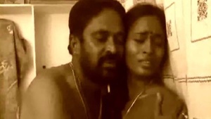 Mother of the maid attacks her in a South Indian erotic movie.