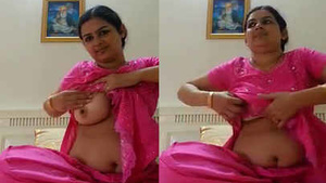 Groaning Punjabi nurse takes a provocative selfie in a bright pink suit