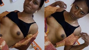 Topless Tamil beauty enjoys giving a big black dick blowjob and sex