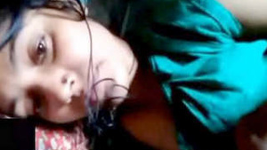 Beautiful Indian housewife exposes her breasts during a video call.