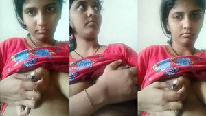 Beautiful Indian wife breastfeeding her husband.