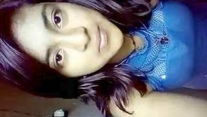 A beautiful college student, Ruma, shows off her then perfect body.