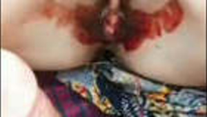 A woman who is a virgin has her seal broken outdoors and becomes filled with blood.